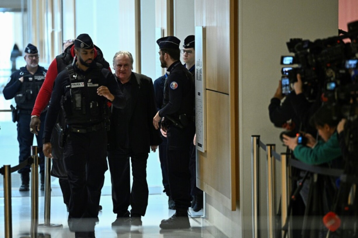 'I'm vulgar, rude, foul-mouthed,' but 'I don't touch,' Depardieu told the court