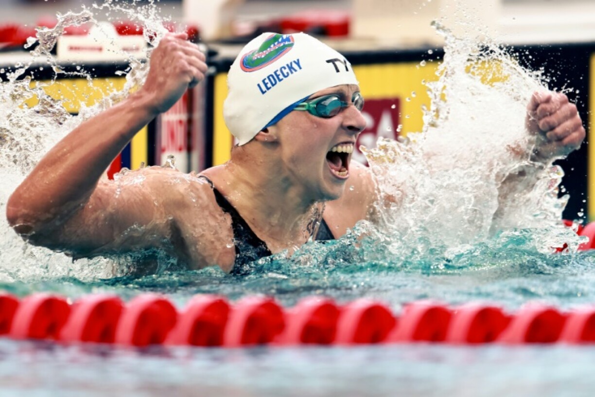 Katie Ledecky celebrates her world record in the 800m freestyle at the Pro Swim Series meeting in Fort Lauderdale, Florida