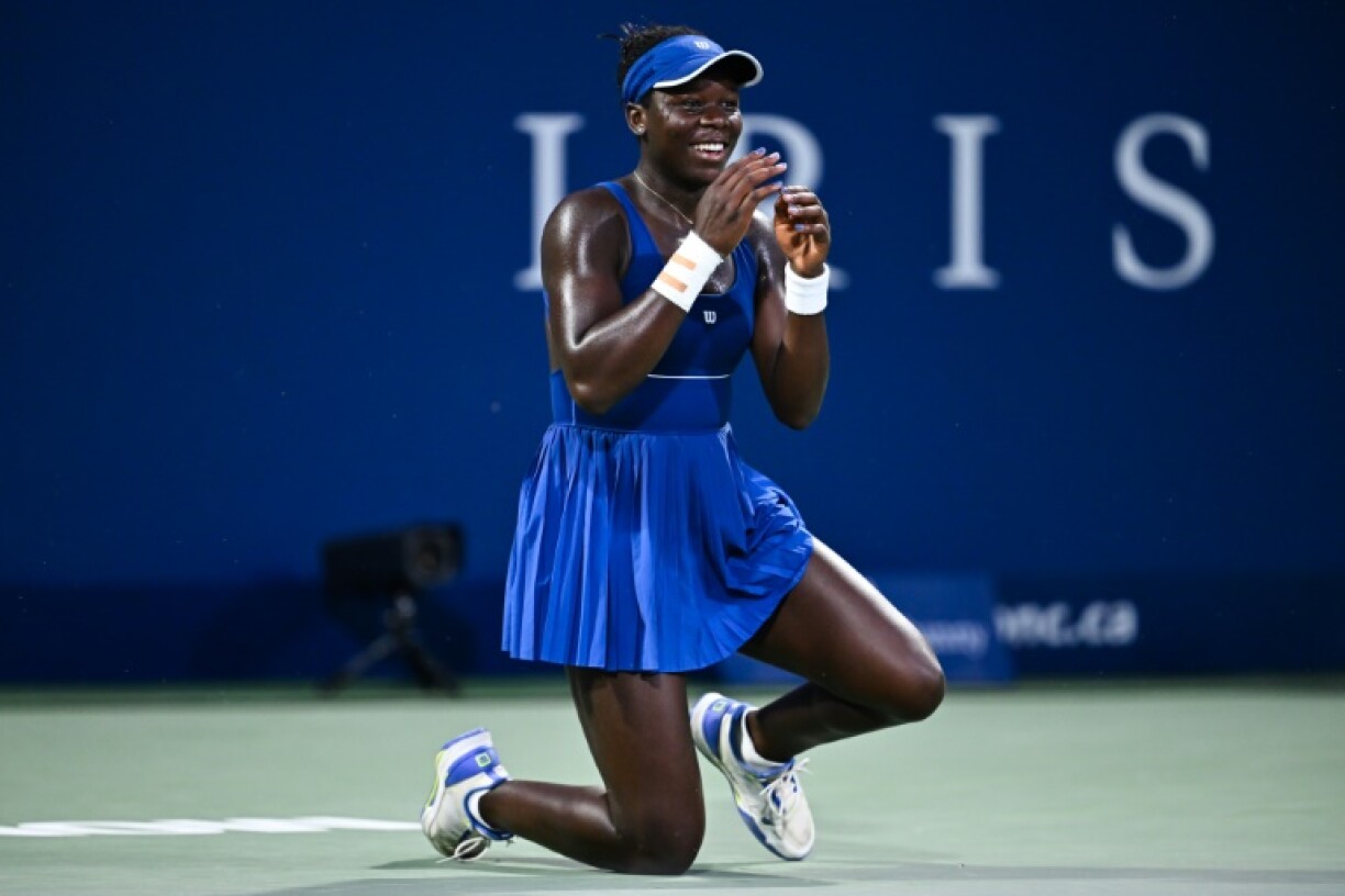 Canadian teen Victoria Mboko celebrates after beating Japan's Naomi Osaka in the WTA Canadian Open final