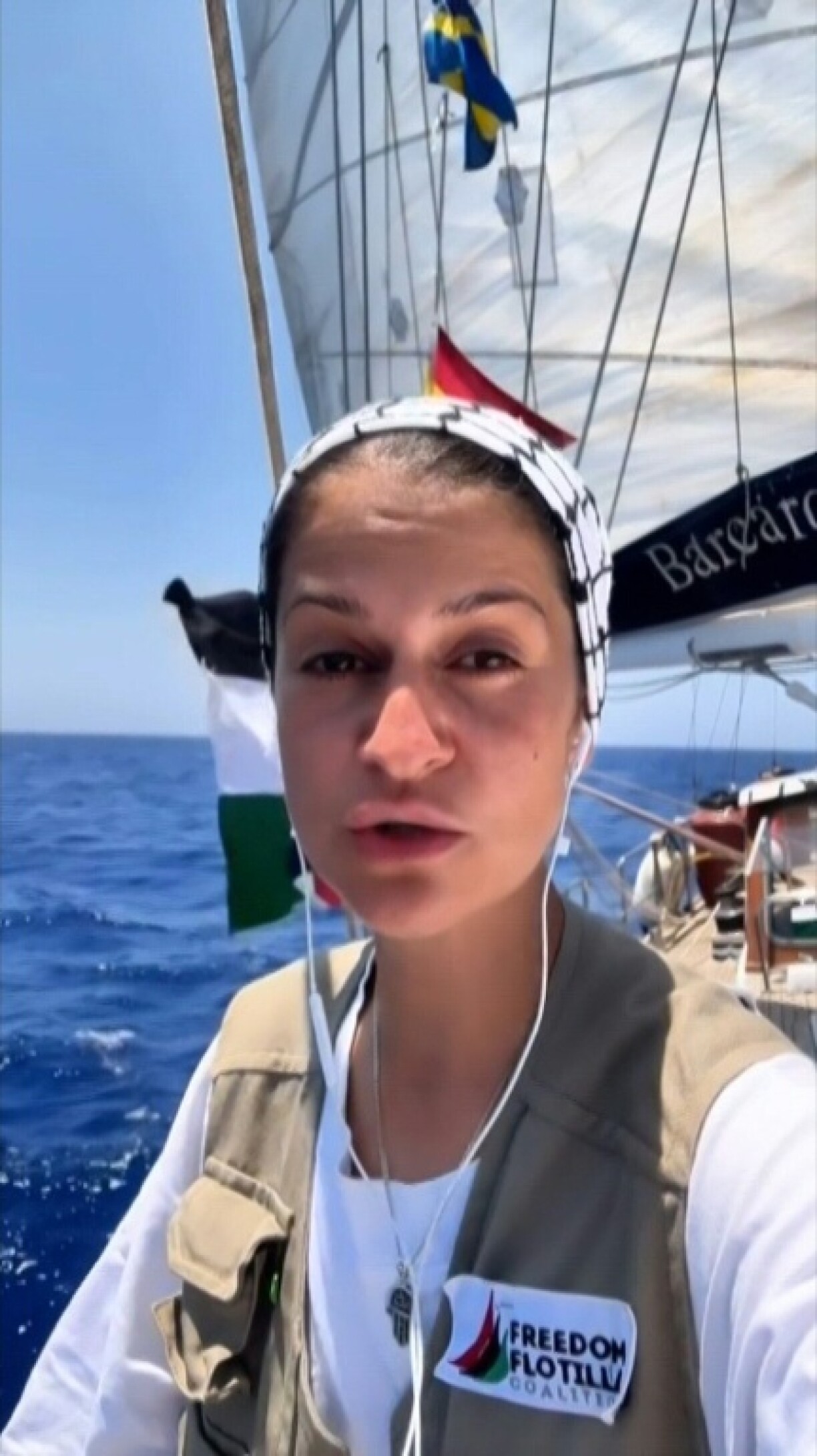 Image grab from a UGC video showing German activist Yasemin Acar delivering a statement from the Gaza-bound Madleen