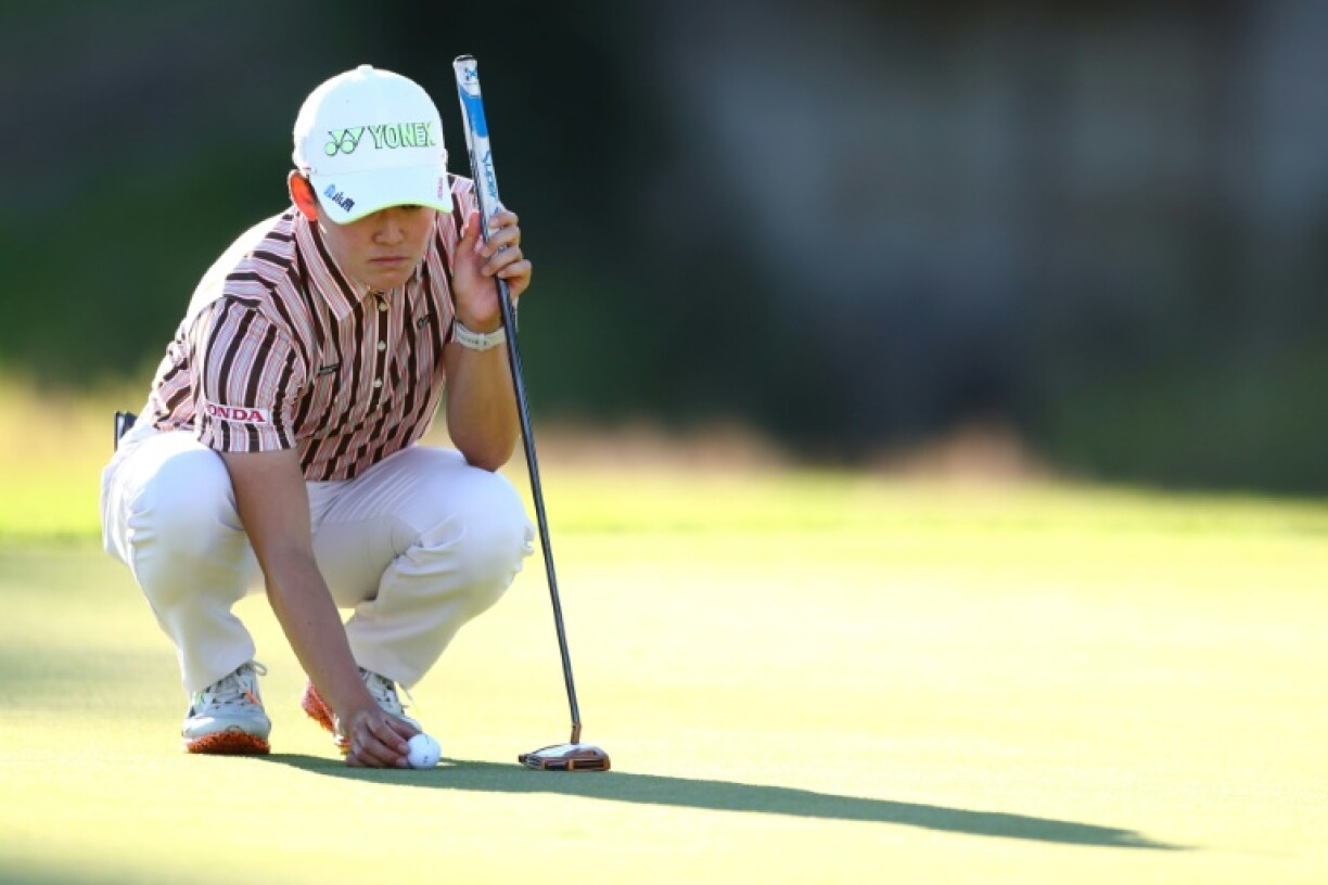 Japan's Akie Iwai lines up a putt on the way to the first-round lead in the LPGA Canadian Women's Open