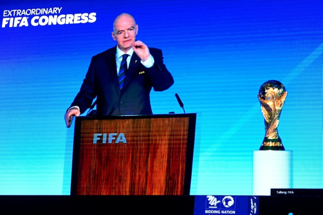 A speech by FIFA president Gianni Infantino is broadcast on a screen in Saudi's capital Riyadh as the Gulf kingdom is confirmed as 2034 World Cup host