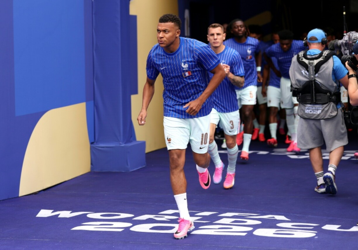 L'équipe de France, emmenée par son capitaine Kylian Mbappé, avant le troisième match de poule des Bleus à la Coupe du monde, le 26 juin 2026 contre la Norvège, à Foxborough