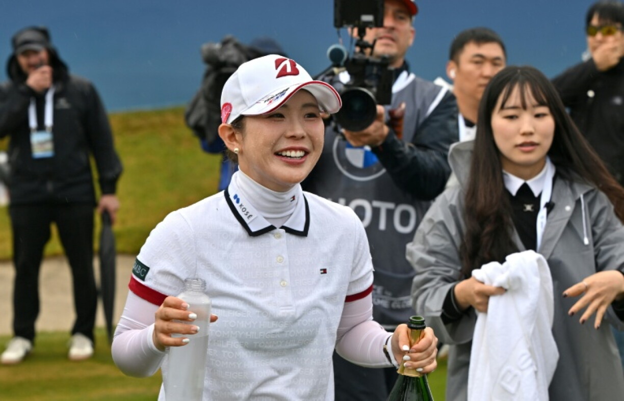 Yuri Yoshida of Japan celebrates her victory