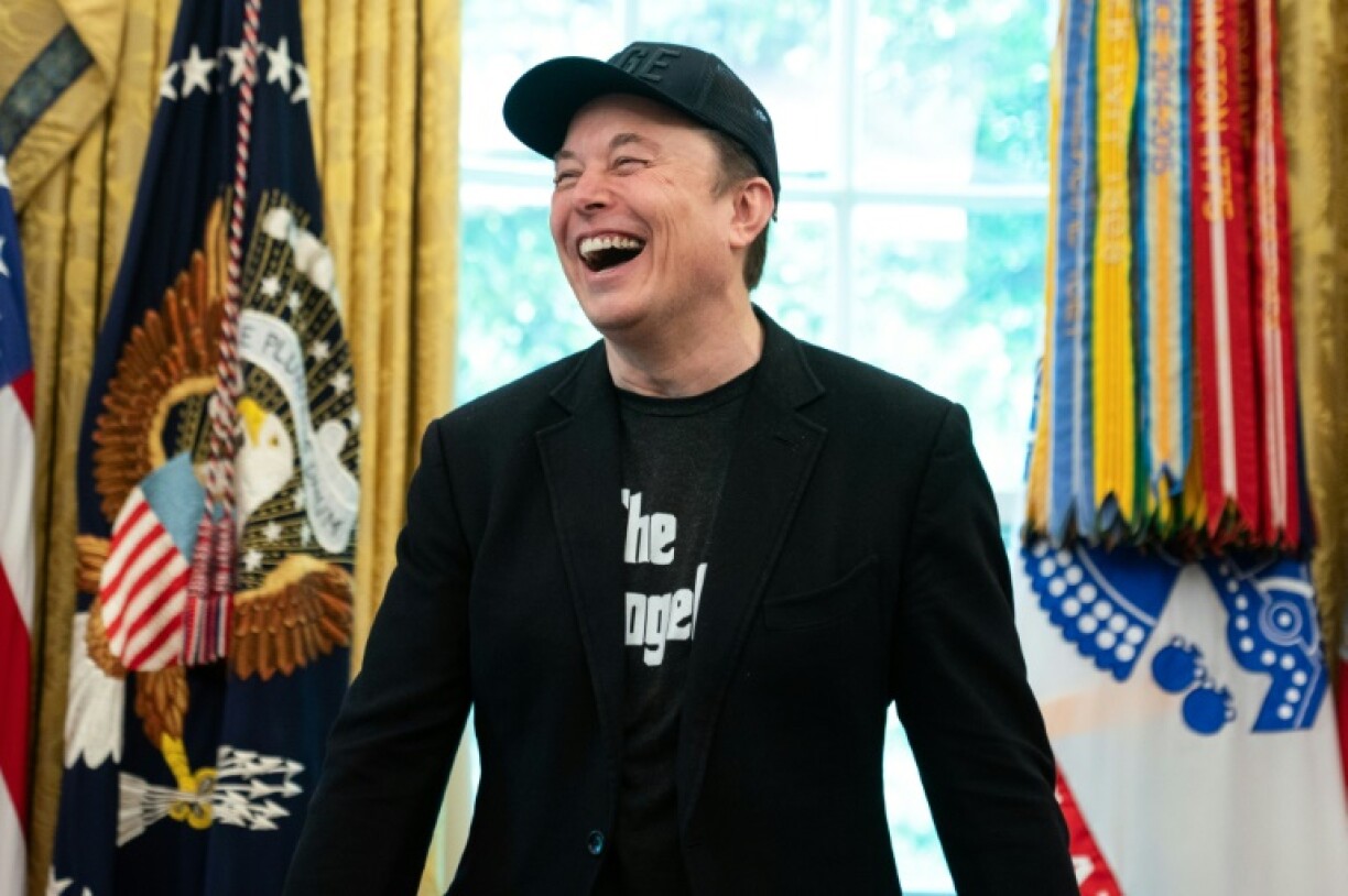 Elon Musk laughs during a news conference with US President Donald Trump in the Oval Office of the White House in Washington, DC, on May 30, 2025