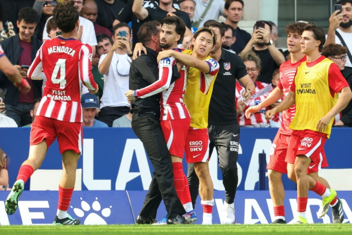 Alex Baena celebrates his last-gasp winner for Atletico Madrid at Espanyol on Saturday in La Liga