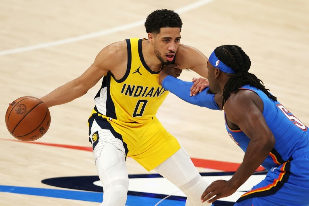 Indiana star Tyrese Haliburton is kept at bay by Oklahoma City's defense in game two of the NBA Finals