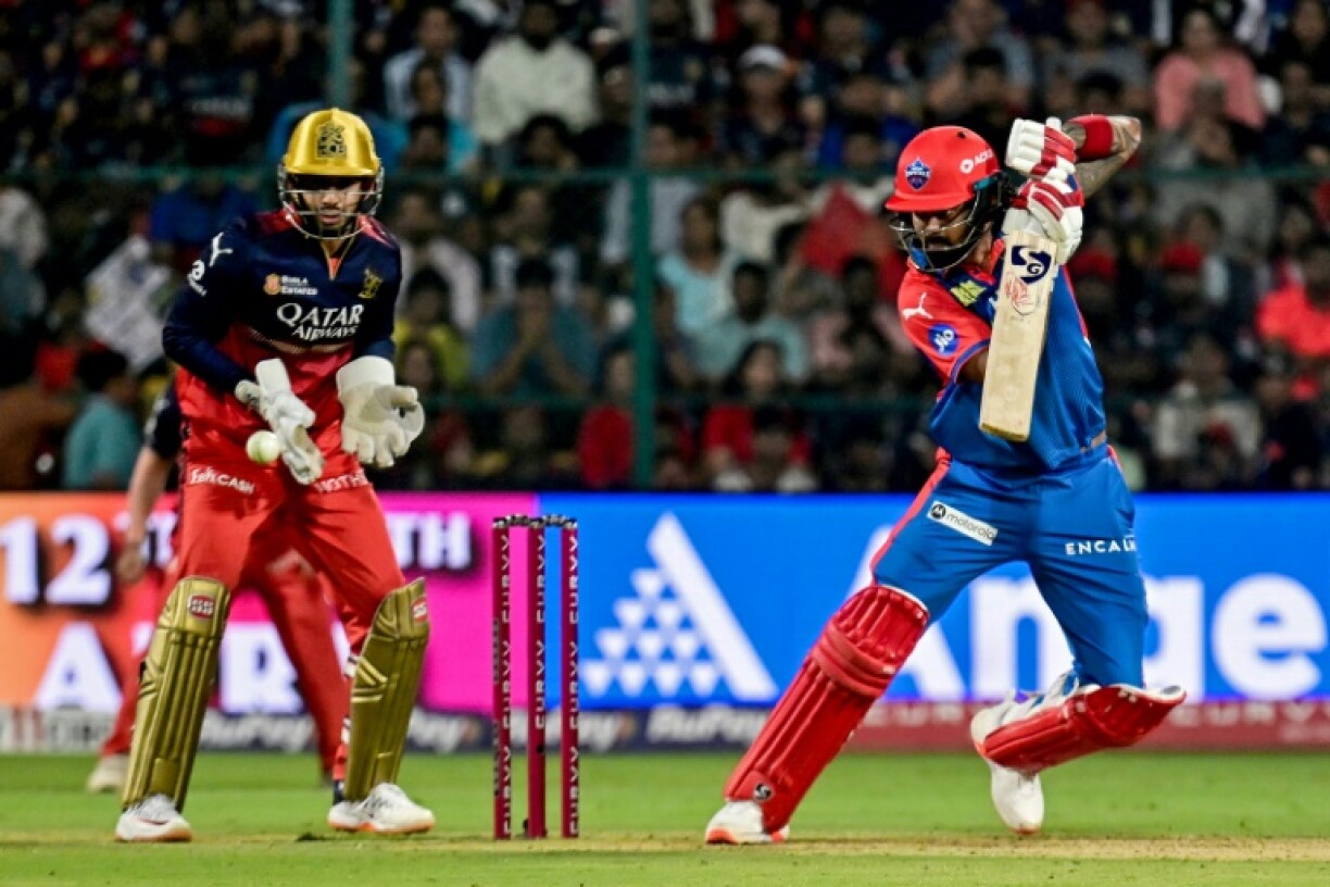 Delhi Capitals' KL Rahul (R) plays a shot on his way to posting an unbeaten 93 against Royal Challengers Bengaluru