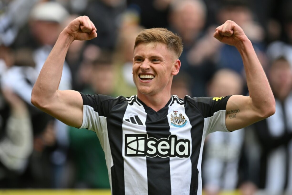 Newcastle's Harvey Barnes celebrates scoring against Manchester United
