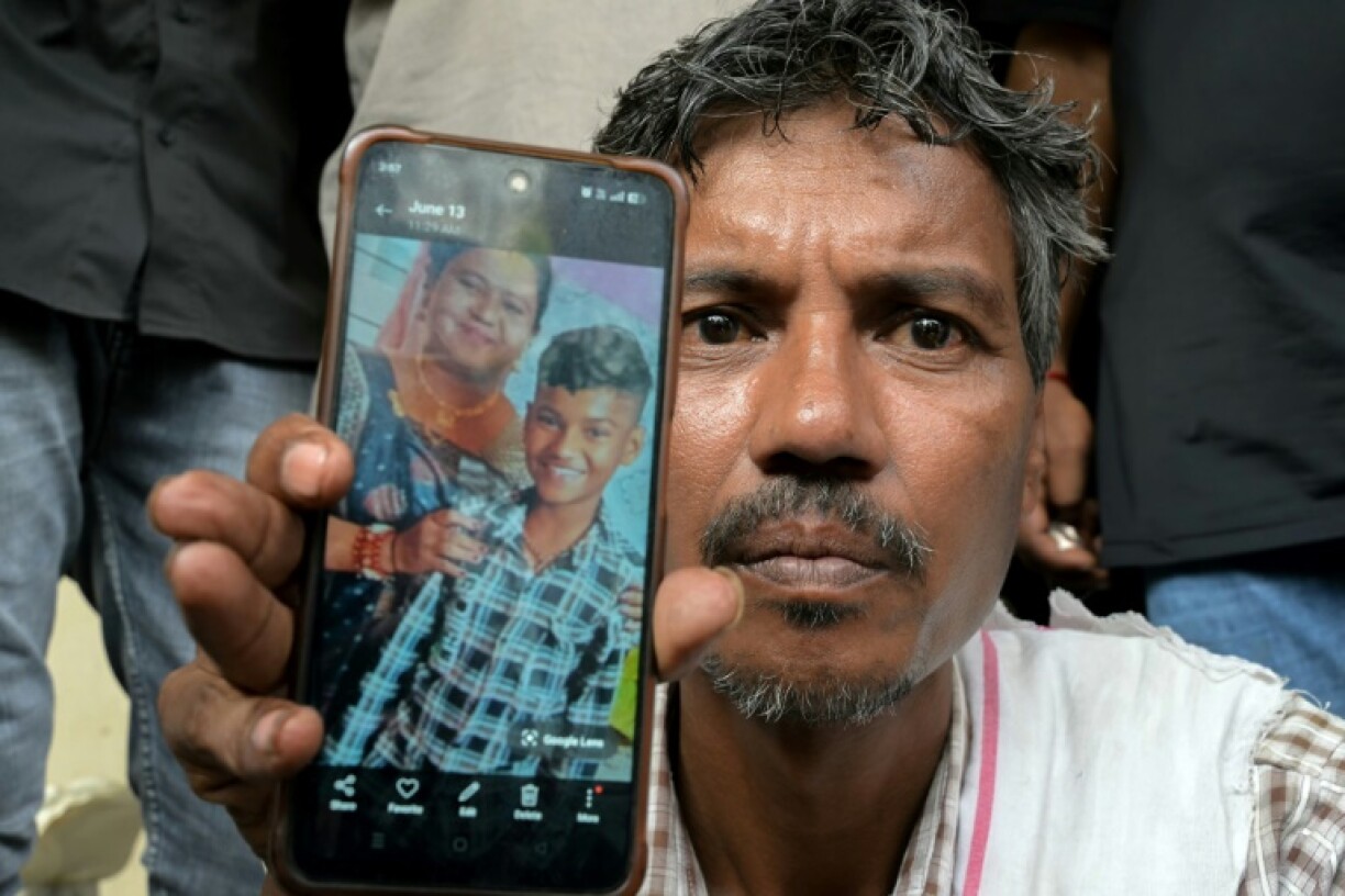 Suresh Patni, a driver, had just dropped his son off at his wife's tea stall when the plane hit and the teenager was killed