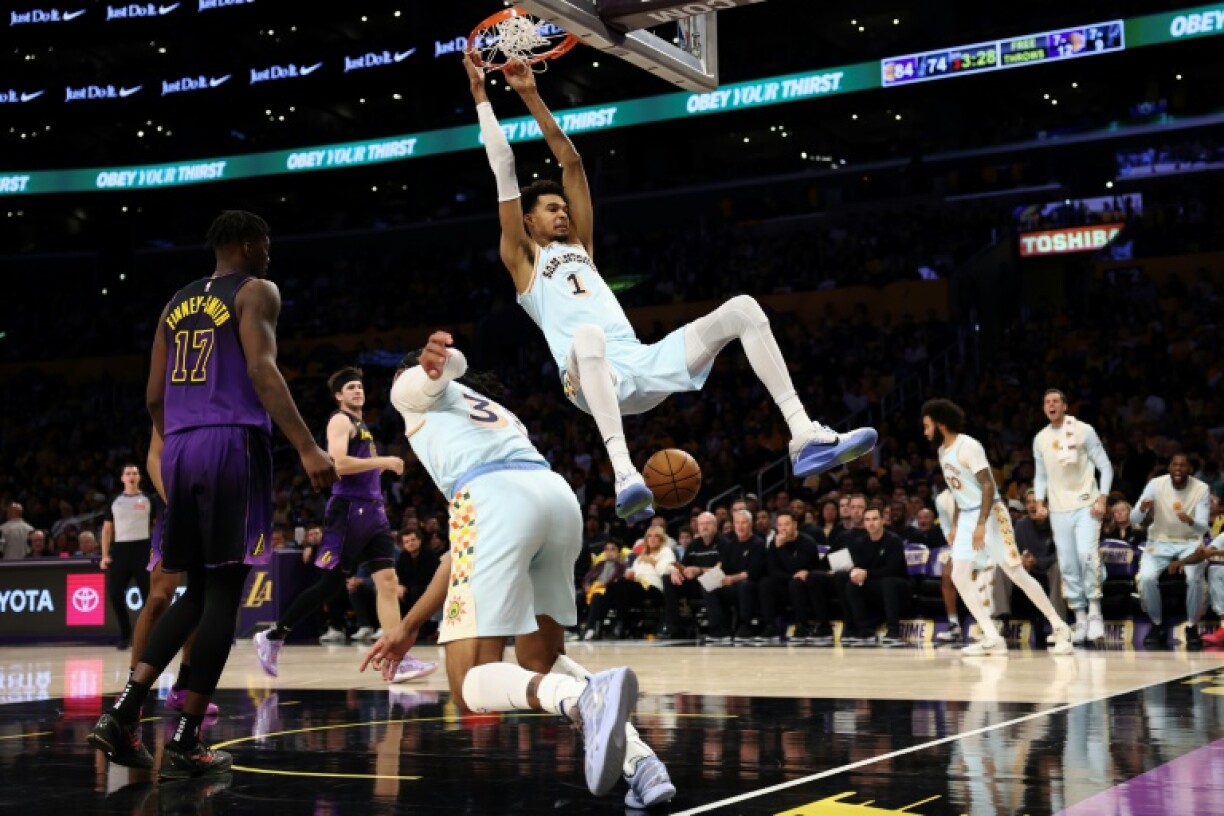 Victor Wembanyama of the San Antonio Spurs throws down a dunk in the Spurs' NBA victory over the Los Angeles Lakers