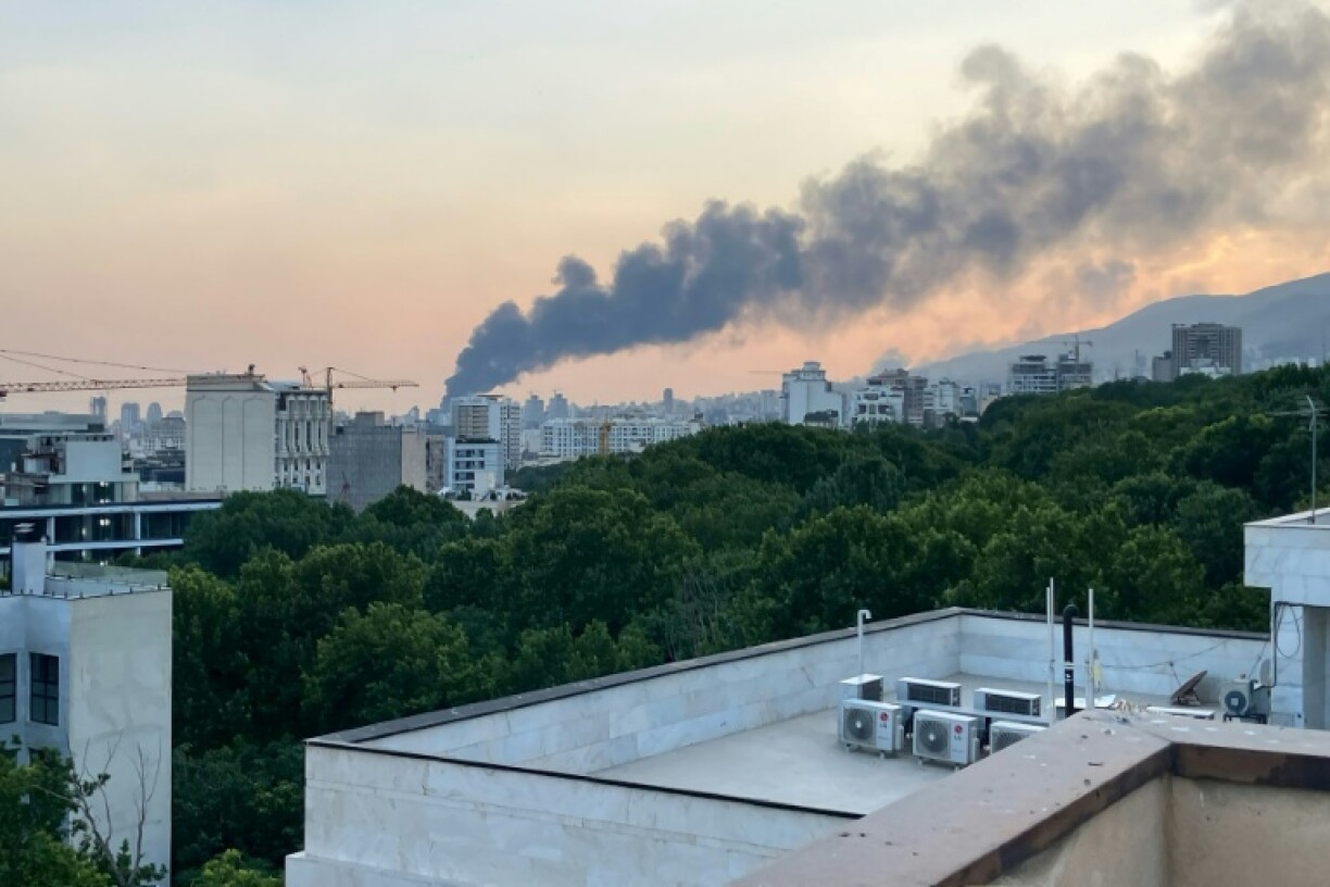 Smoke billows from an explosion at Iran's state broadcaster on June 16, 2025