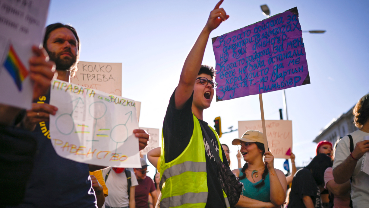 Protesters chant during a demonstration against a new law banning LGBTQ