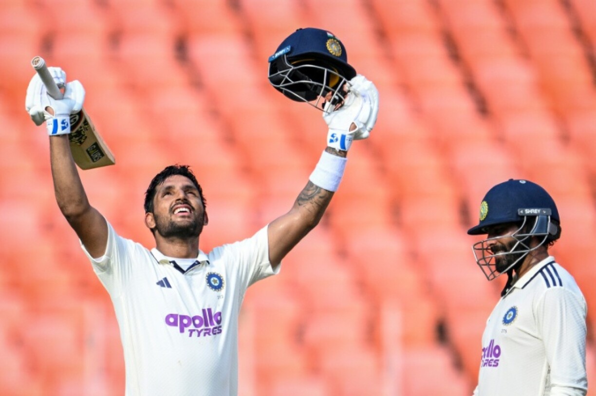 India's Dhruv Jurel (L) celebrates after scoring a century
