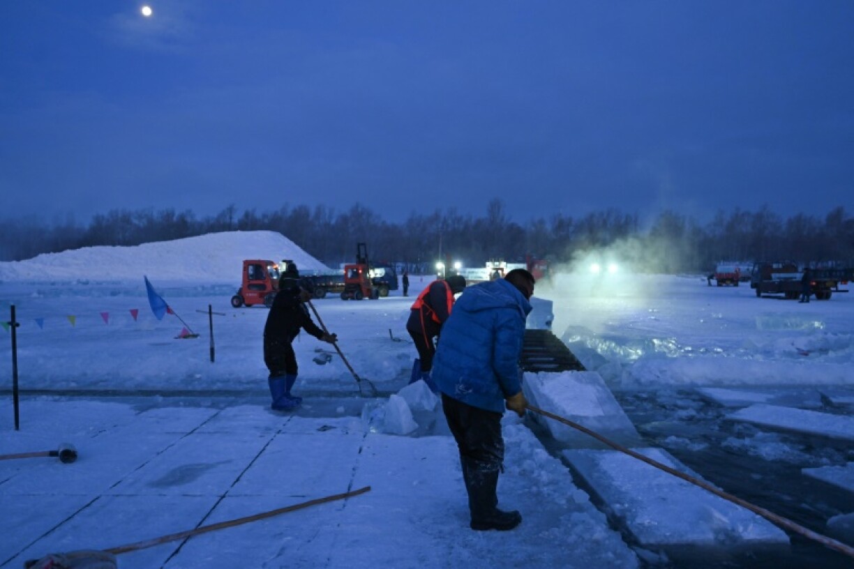 Workers begin harvesting ice before dawn