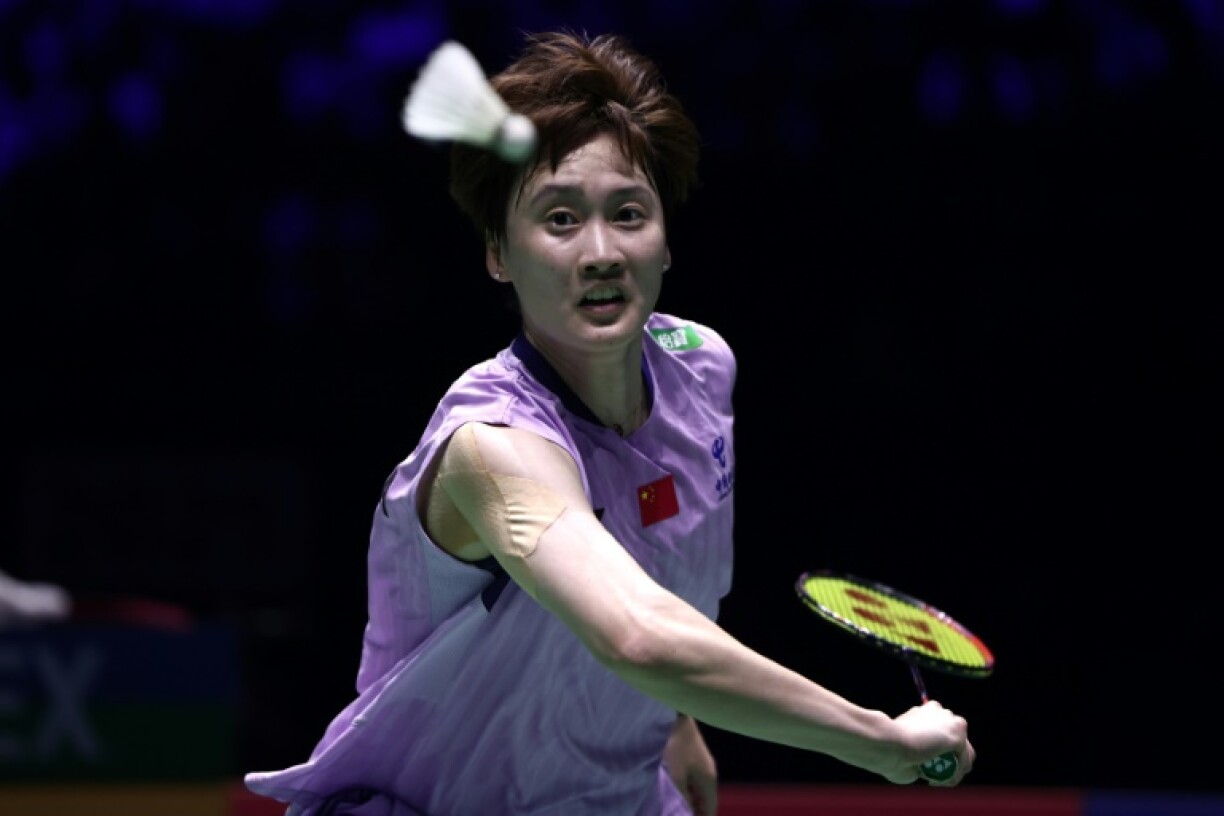 Former Olympic gold medallist Chen Yufei of China hits a return to South Korea's An Se-young