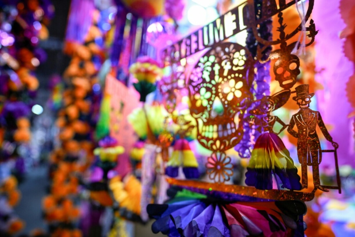 Skulls and skeletons wearing top hats are just some of the designs seen on colorful paper banners during Mexico's emblematic Day of the Dead festival in early November