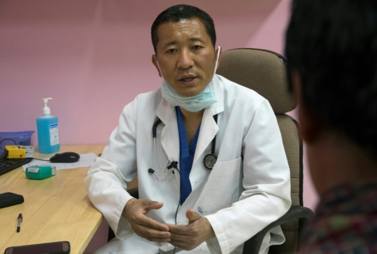 Bhutan's Prime Minister Lotay Tshering (pictured in 2019) is a physician who still conducts surgeries on the weekend as a 'de-stresser' from the pressures of office