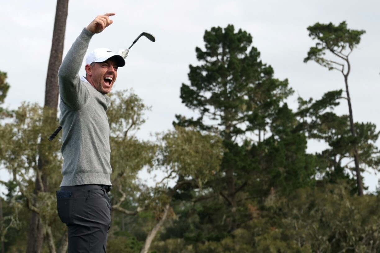 Rory McIlroy celebrates his hole-in-one on the 15th hole at Spyglass Hill during the first round of the PGA Tour's Pebble Beach Pro-Am