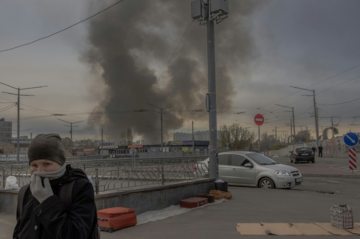 In Kyiv, explosions were heard overnight and a dark plume of smoke rose up from the city early Sunday