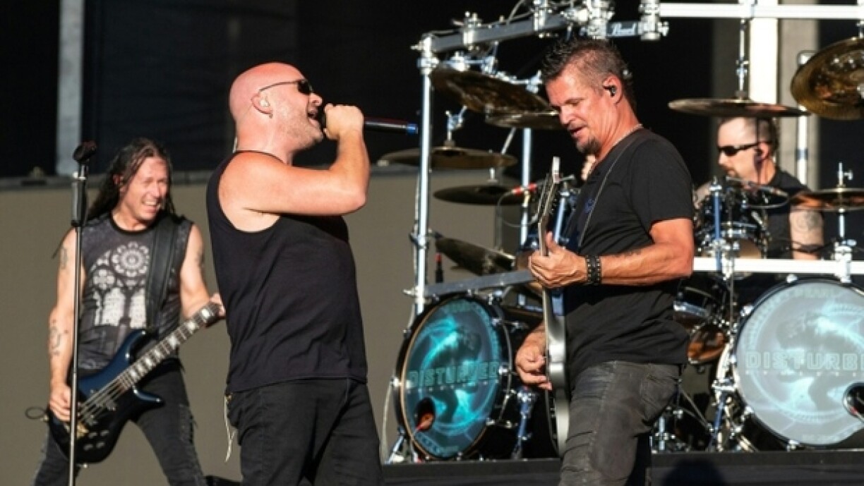 (g-d) John Moyer, David Draiman, Dan Donegan et Mike Wengren du groupe Disturbed en concert à Austin, le 13 octobre 2018 au Texas