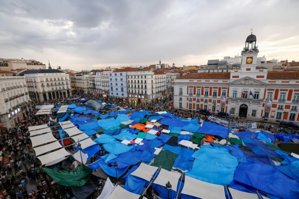 In Madrid, activists and protesters have been camping for about a week in Puerta del Sol, one of the capital's main tourist squares