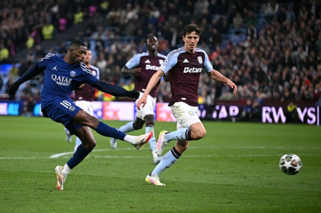 Ousmane Dembele (L) in action for Paris Saint-Germain against Aston Villa on Wednesday