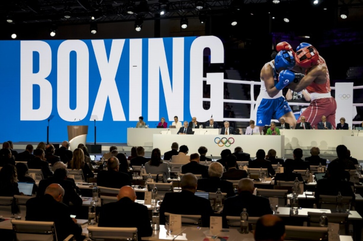 IOC members at a Session in Costa Navarino in Greece vote for the inclusion of boxing at the 2028 Los Angeles Olympics