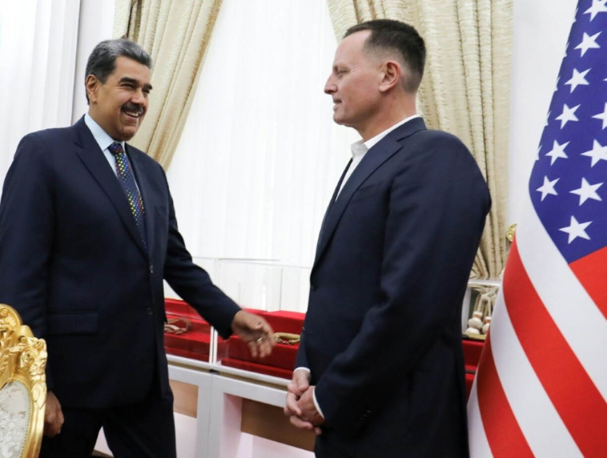 Venezuelan President Nicolas Maduro (L) has said talks with US envoy Richard Grenell were held in 'mutual respect'