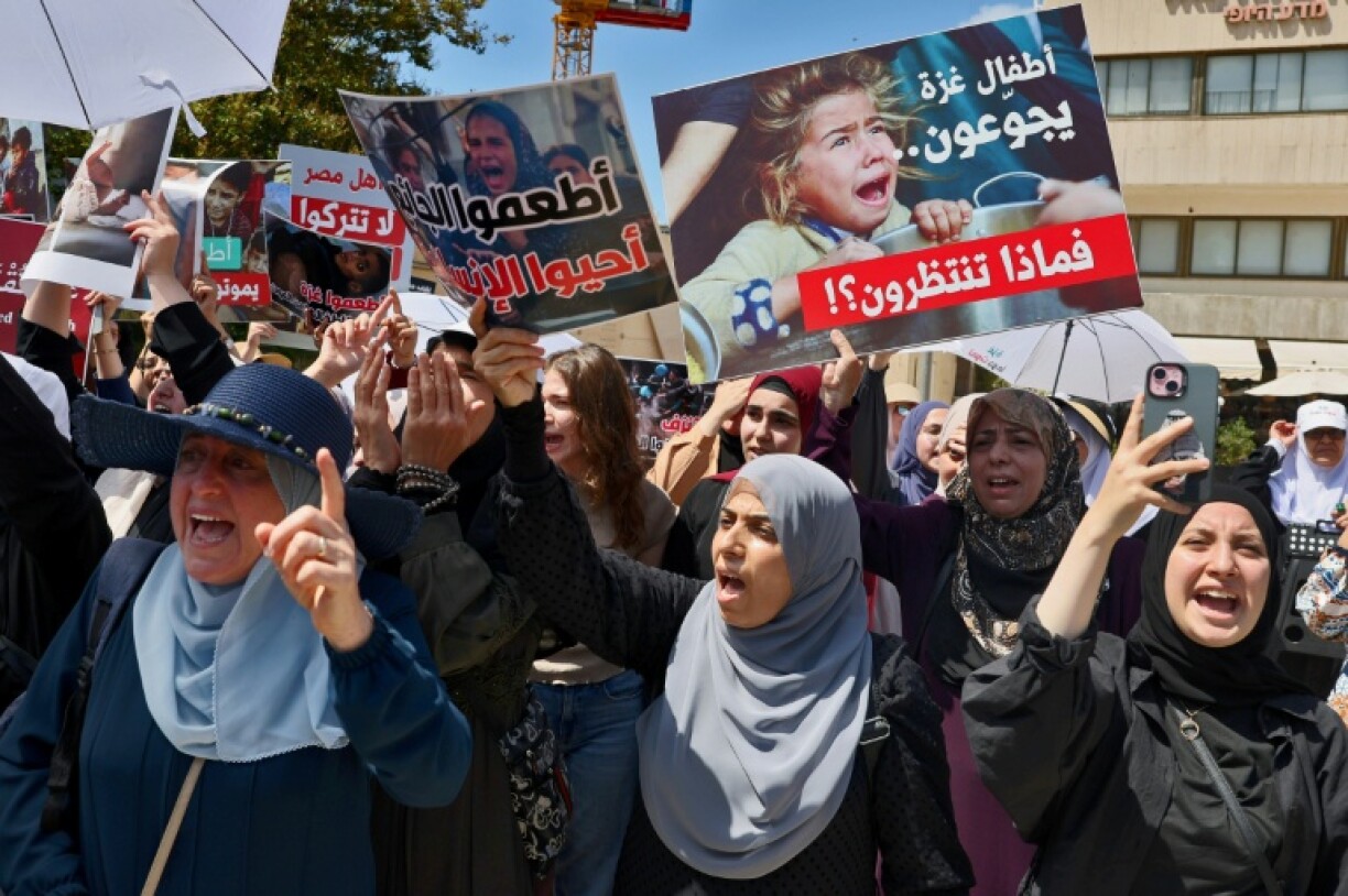 Protesters near the Egyptian embassy in Tel Aviv called for the opening of a land crossing and entry of aid into Gaza