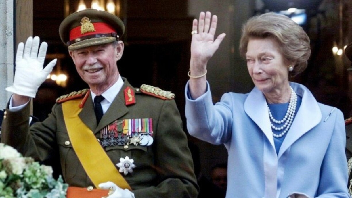 Grand Duke Jean and Grand Duchess Josephine-Charlotte greeting the crowds after his official abdication.