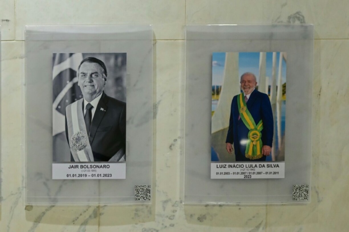 Portraits of former Brazilian president Jair Bolsonaro and current President Luis Ignacio Lula da Silva in the presidential palace in Brasilia