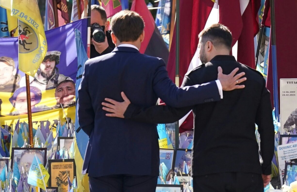 The symbolic show of European unity came a day after a parade in Moscow