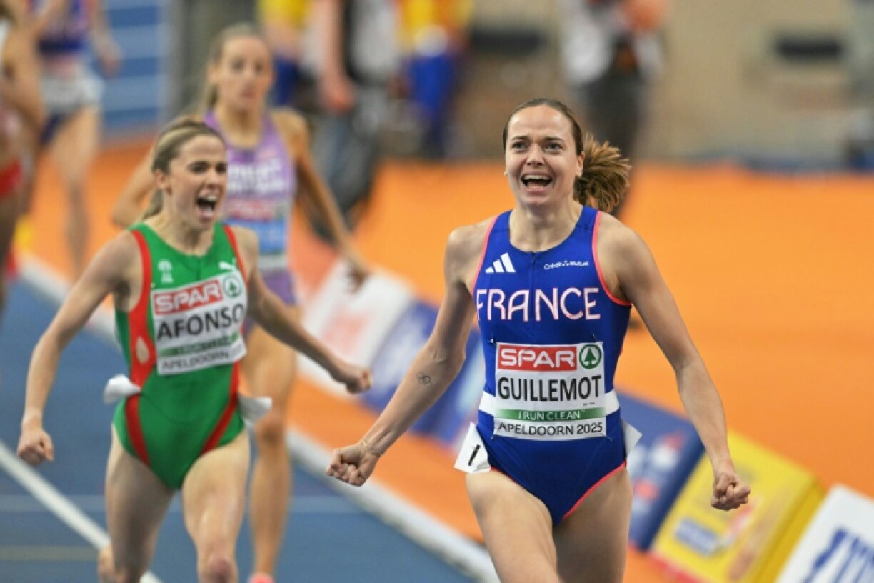 France's Agathe Guillemot (R) celebrates