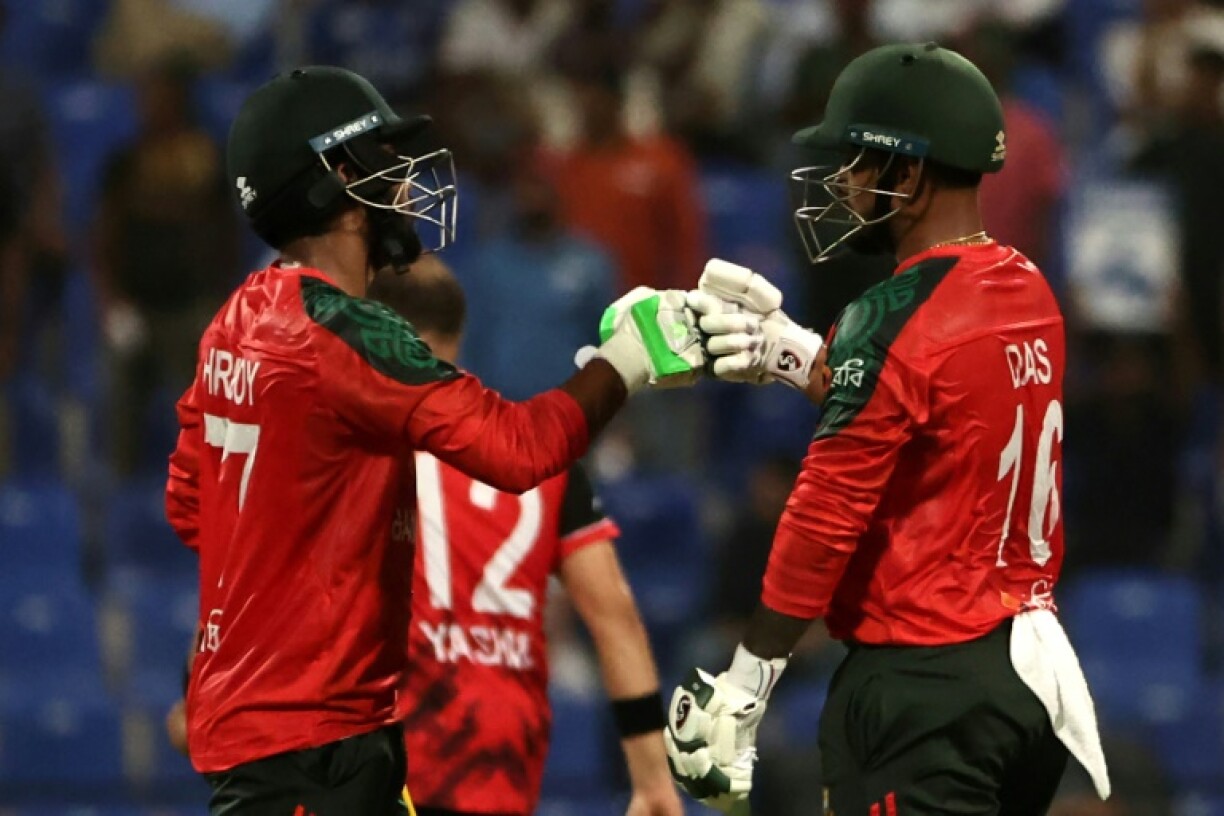 Bangladesh captain Litton Das (R) and Towhid Hridoy bump their fists during their Asia Cup win against Hong Kong