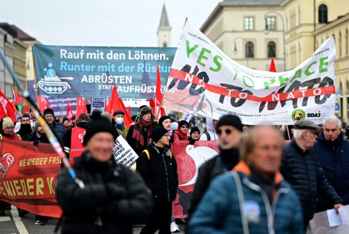 Anti-war demonstrators gathered outside the conference in Munich