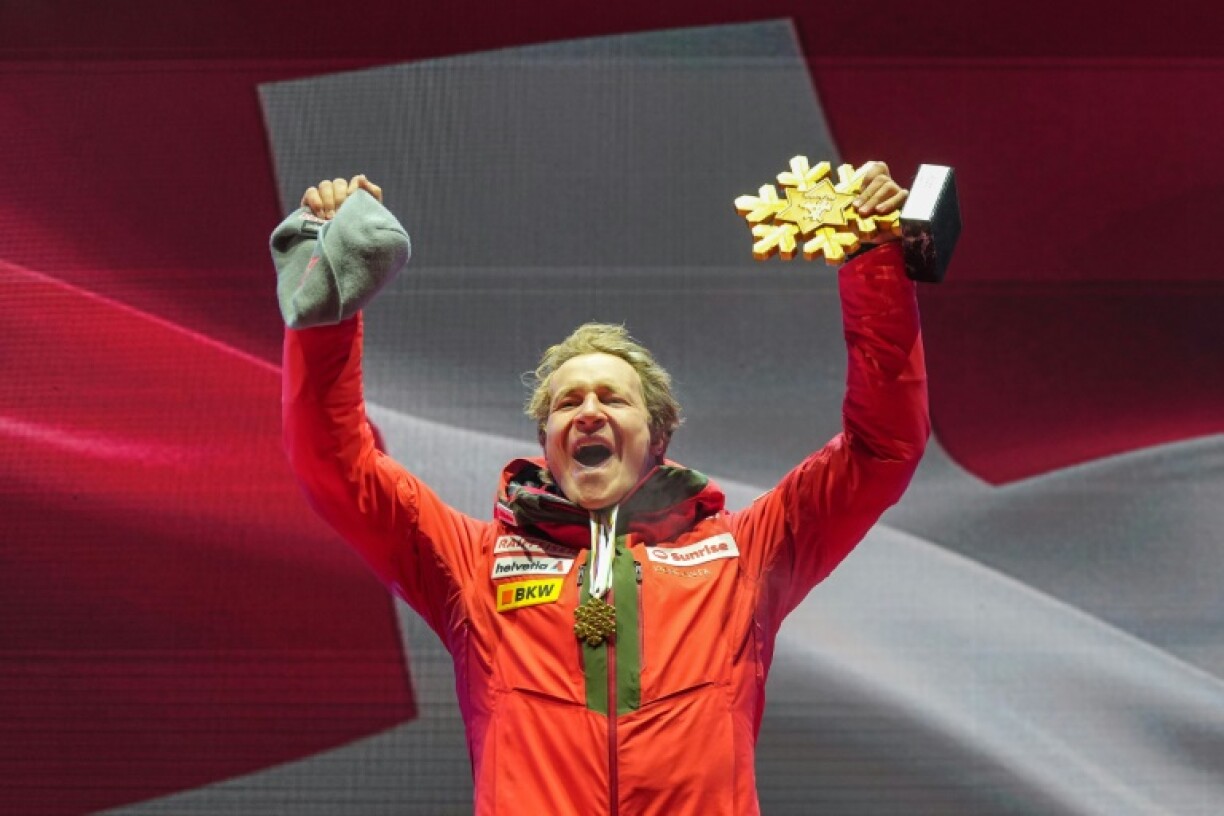Switzerland's Marco Odermatt celebrates after his super-G win