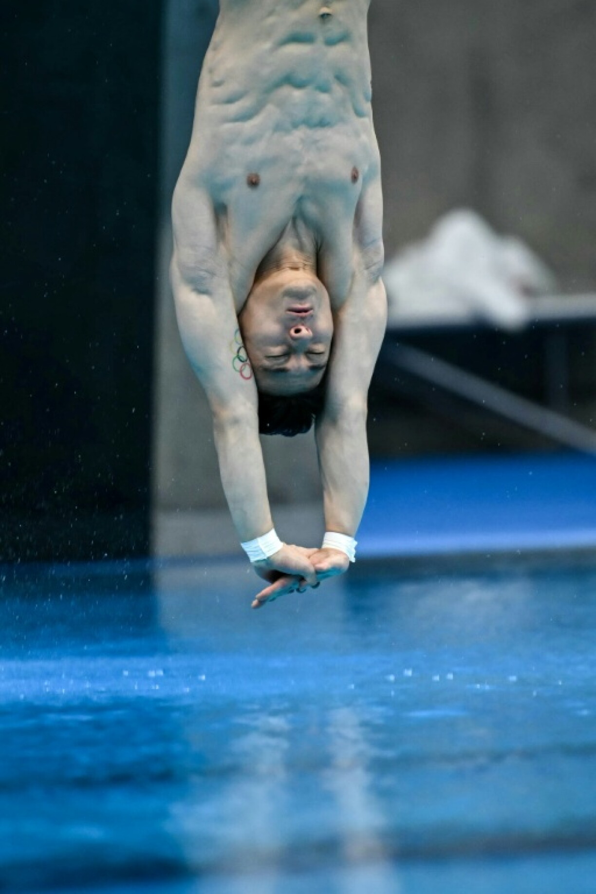 South Korea's Kim Yeong-taek competes in the men's 3m springboard final