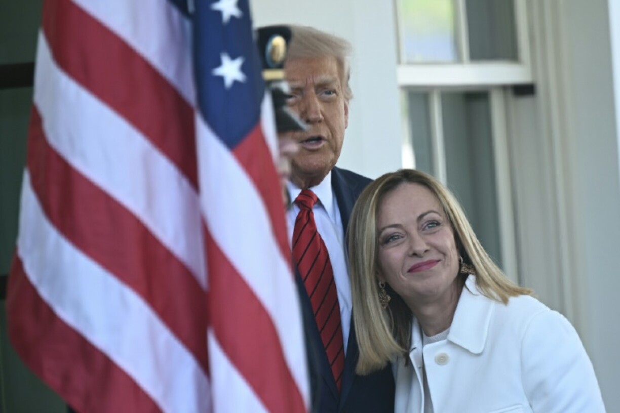 Italian Prime Minister Giorgia Meloni (R) was the only European leader invited to US President Donald Trump's inauguration in January 2025