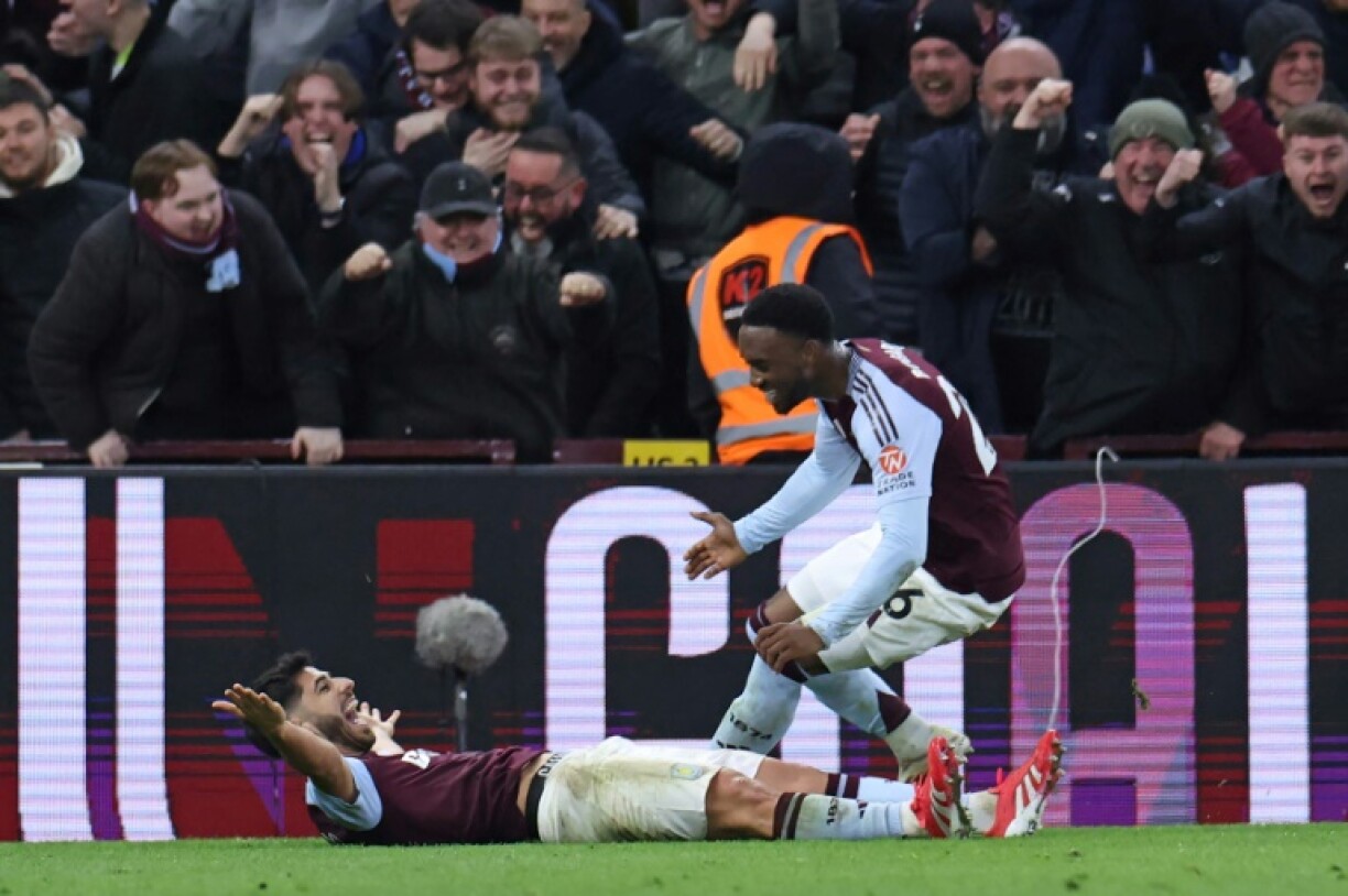 Aston Villa's Marco Asensio (L) celebrates after scoring against Chelsea