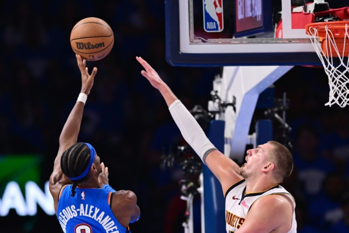 OKC's Shai Gilgeous-Alexander shoots over NBA MVP rival Nikola Jokic in the Thunder's game seven drubbing of Denver