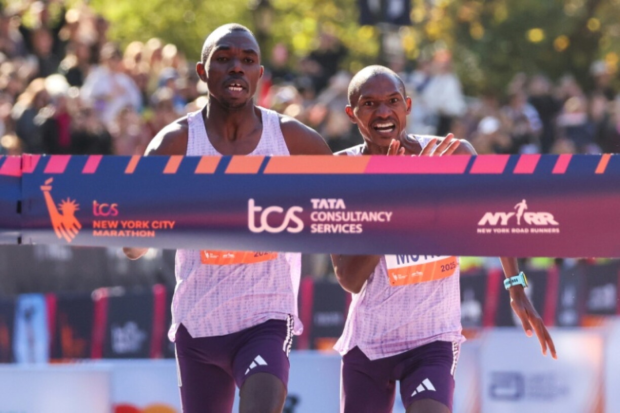 Benson Kipruto, left, edges fellow Kenyan Alexander Mutiso at the finish line to win the 2025 New York Marathon and hopes for a repeat title in the 2026 event