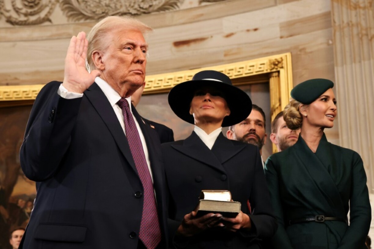 U.S. President-elect Donald Trump takes the oath of office as Melania Trump, Ivanka Trump, Donald Trump Jr. and Eric Trump look on during inauguration ceremonies in the Rotunda of the U.S. Capitol on January 20, 2025 in Washington, DC. Donald Trump takes office for his second term as the 47th president of the United States.