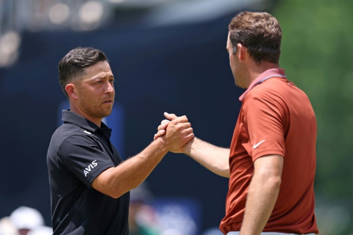 US stars Xander Schauffele, left, and Scottie Scheffler were upset about mud balls at the PGA Championship that led to a double bogey for each after the PGA of America decided not to allow preferred lies despite days of rain at Quail Hollow