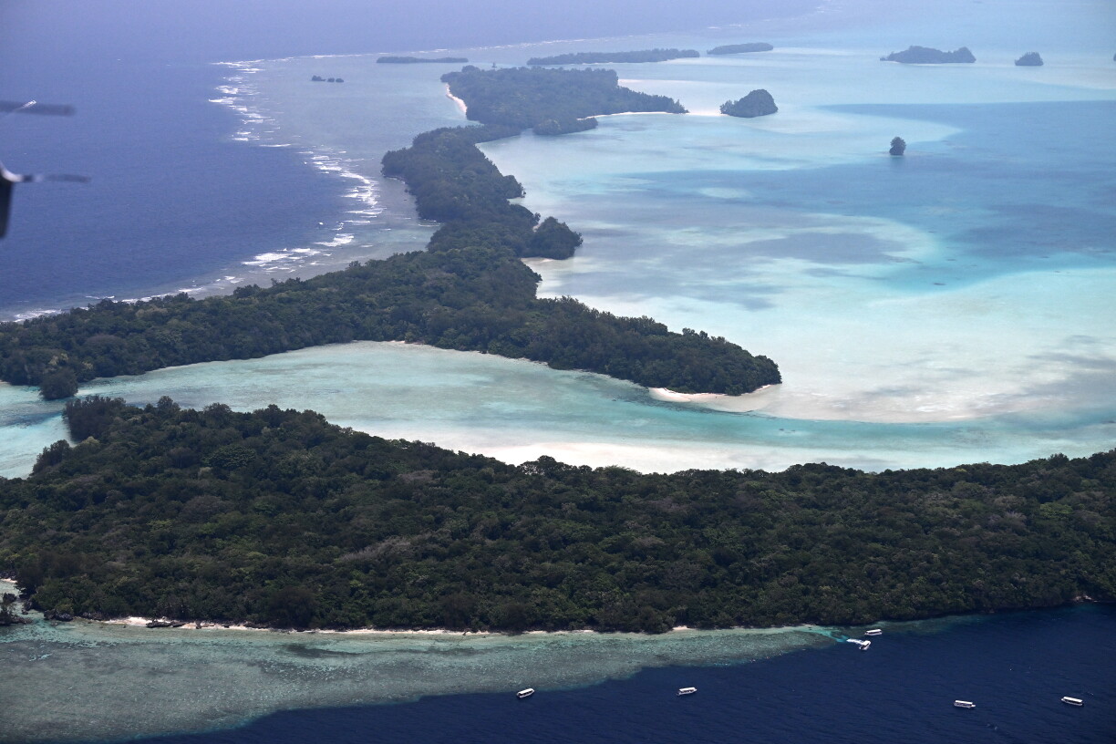 This picture taken on September 4, 2026, shows an aerial view of the small islands off the coast of Koror, the capital of Palau, scattered across the turquoise waters of the Pacific Ocean.