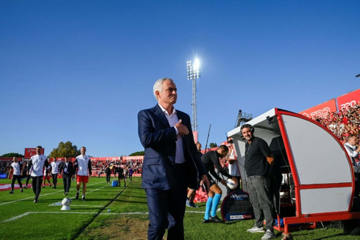 Benfica's Portuguese coach Jose Mourinho takes his position at the start of the game against AVS on Saturday
