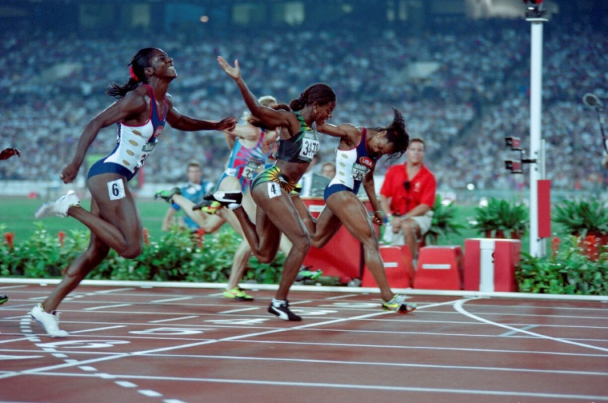 Merlene Ottey (C) the nearly woman of Olympic sprint titles was still winning medals aged 40