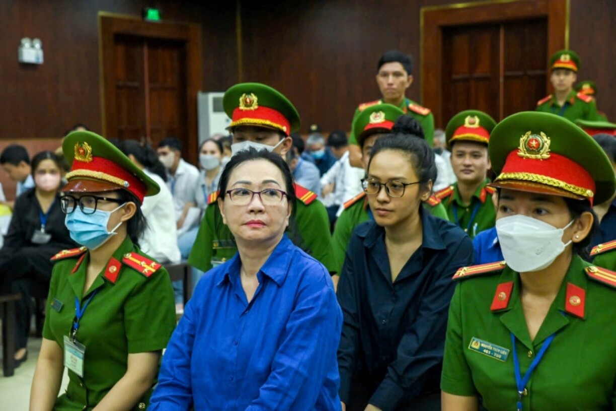 Property tycoon Truong My Lan (C-L) will no longer face the death penalty over a multi-billion-dollar fraud after Vietnam abolished capital punishment for several crimes