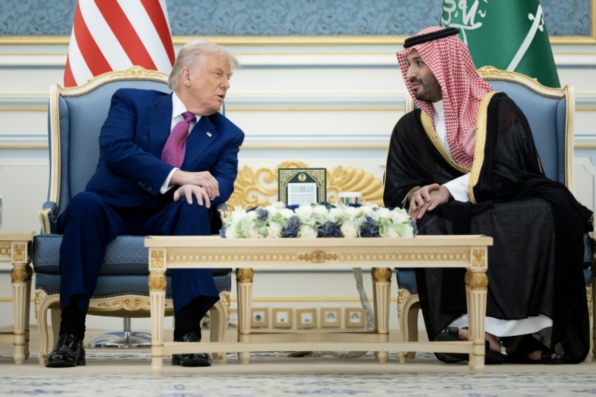 US President Donald Trump talks with Saudi Crown Prince Mohammed bin Salman before a coffee ceremony at the Royal Court in Riyadh.