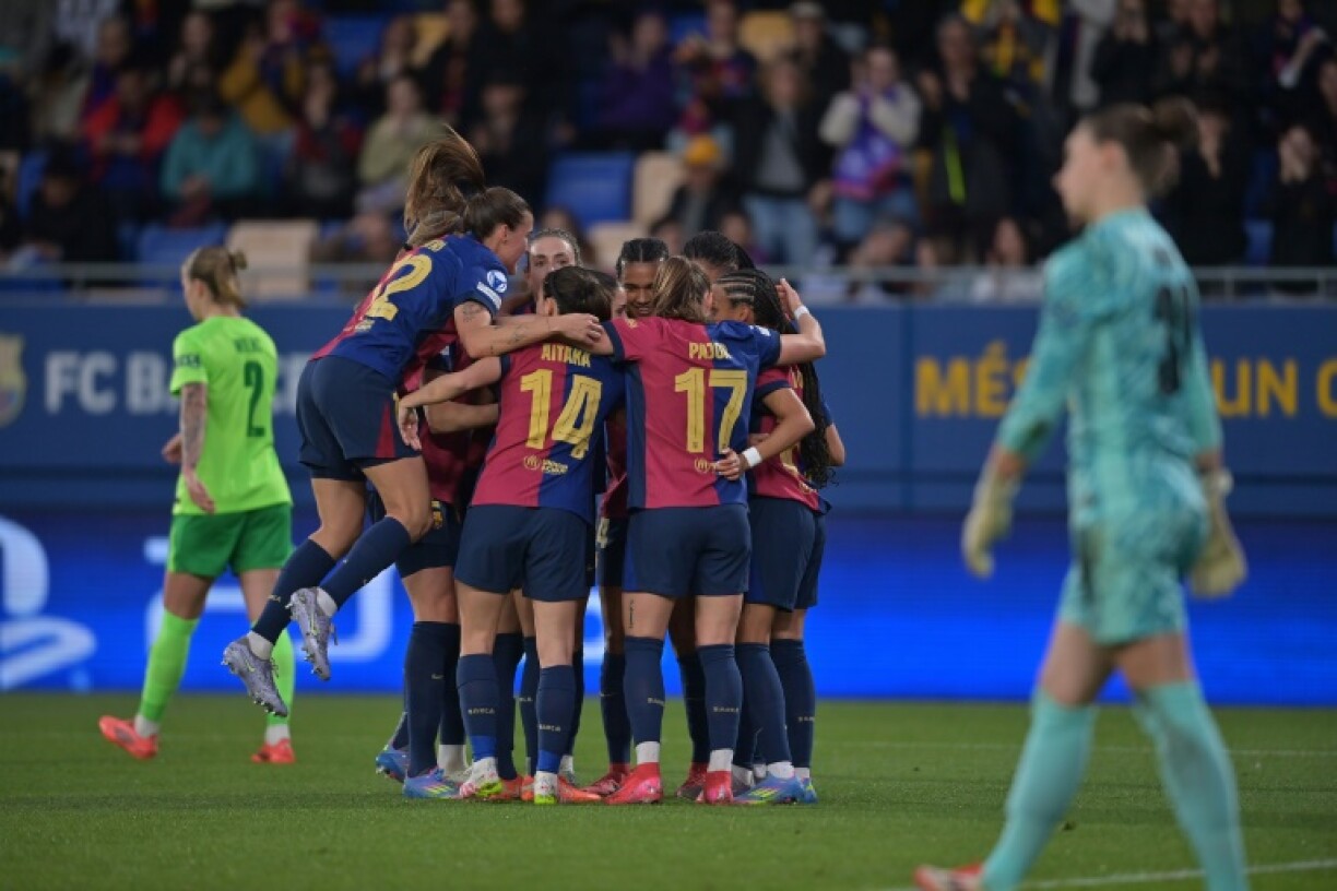 Barcelona's players celebrate their second goal scored by Spanish forward Salma Paralluelo